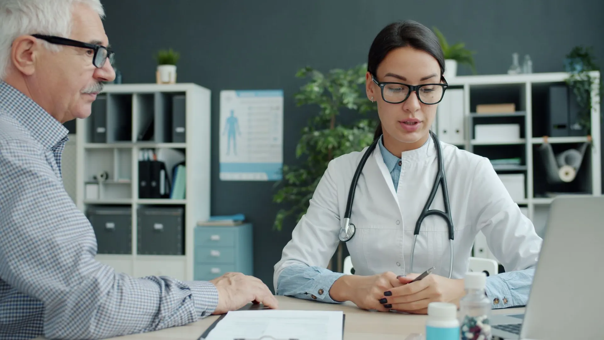 A doctor in consultation with an older patient