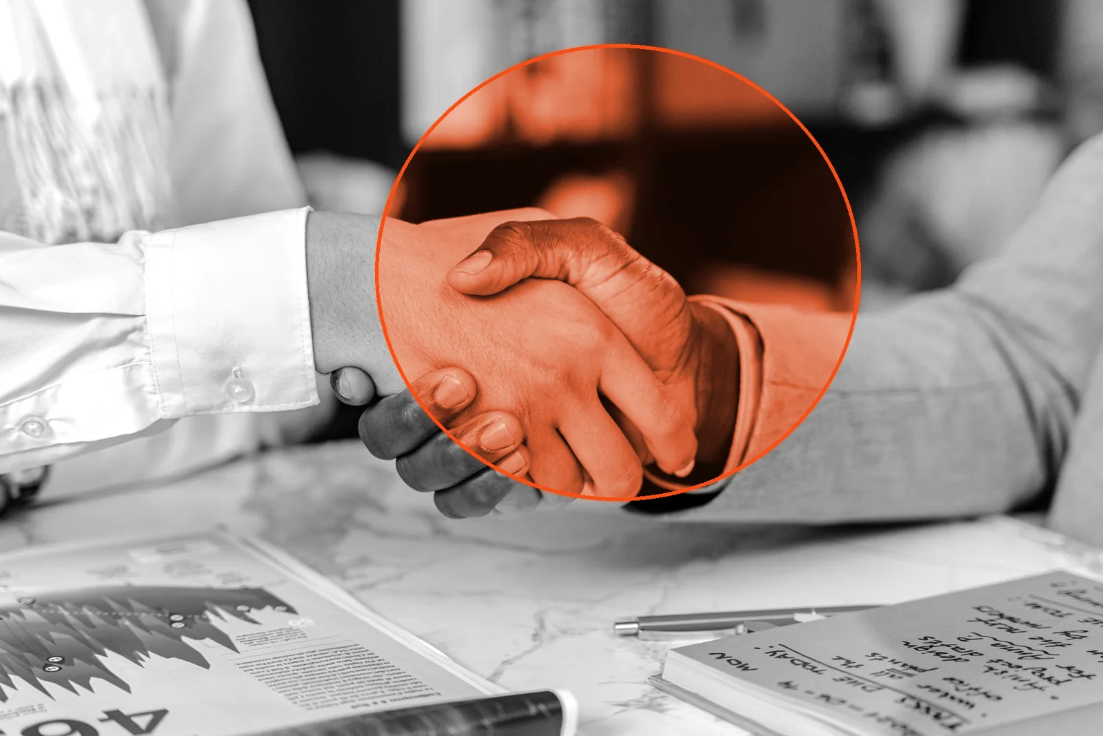 A doctor and a business partner shaking hands